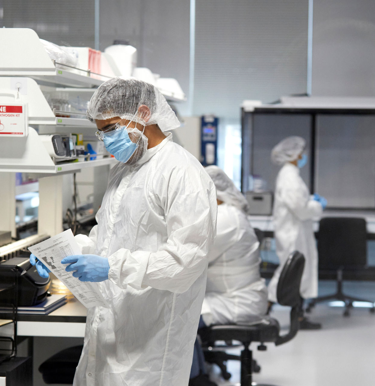 Team of quality specialists in Teknova's quality control lab performing testing on raw materials and finished products