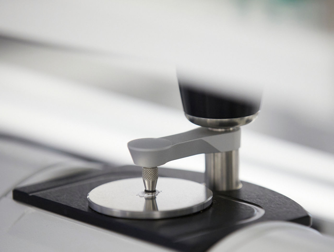 Close up of quality control testing equipment: Fourier Transform Infrared Spectroscopy